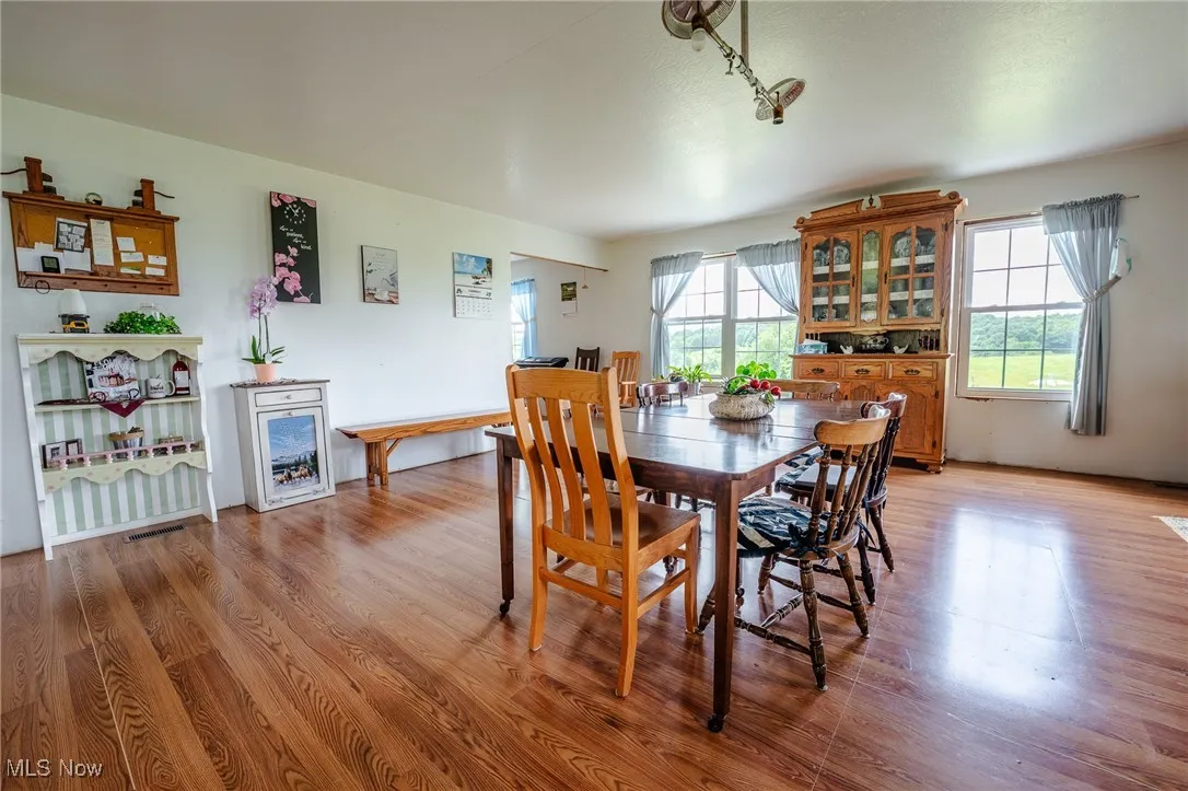 Dining area featuring light wood-style floors