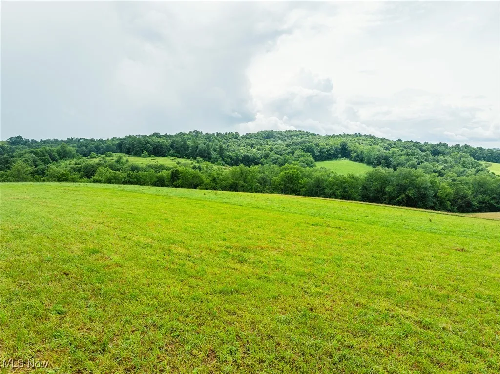 View of green lawn featuring a view of countryside