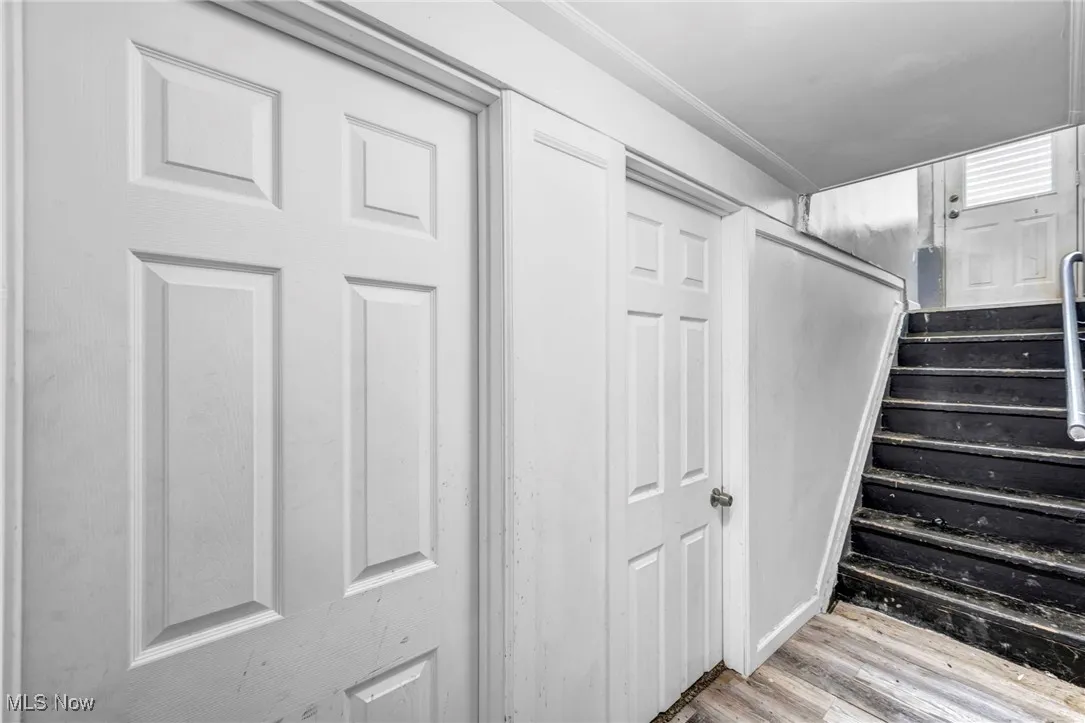 Staircase with wood finished floors