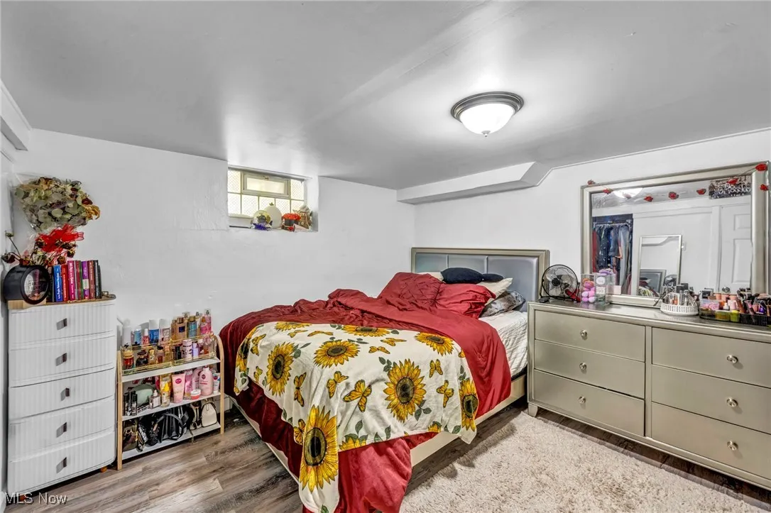 Bedroom with wood finished floors
