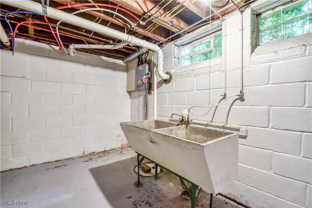 Below grade area featuring a sink