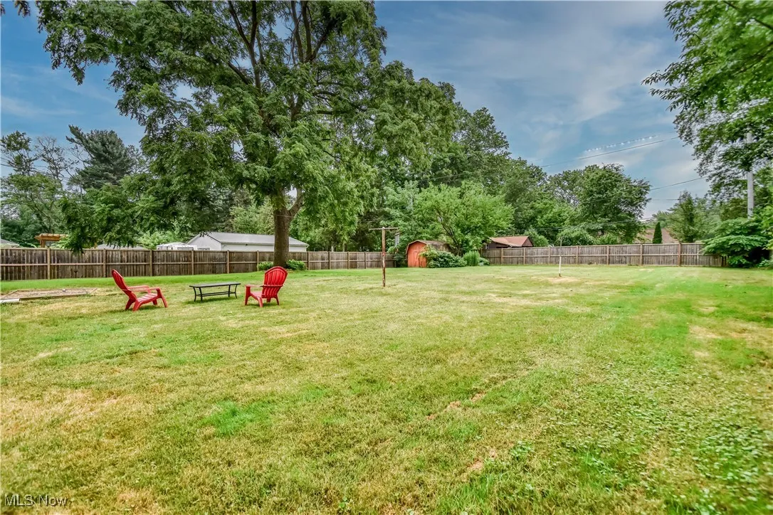View of fenced backyard