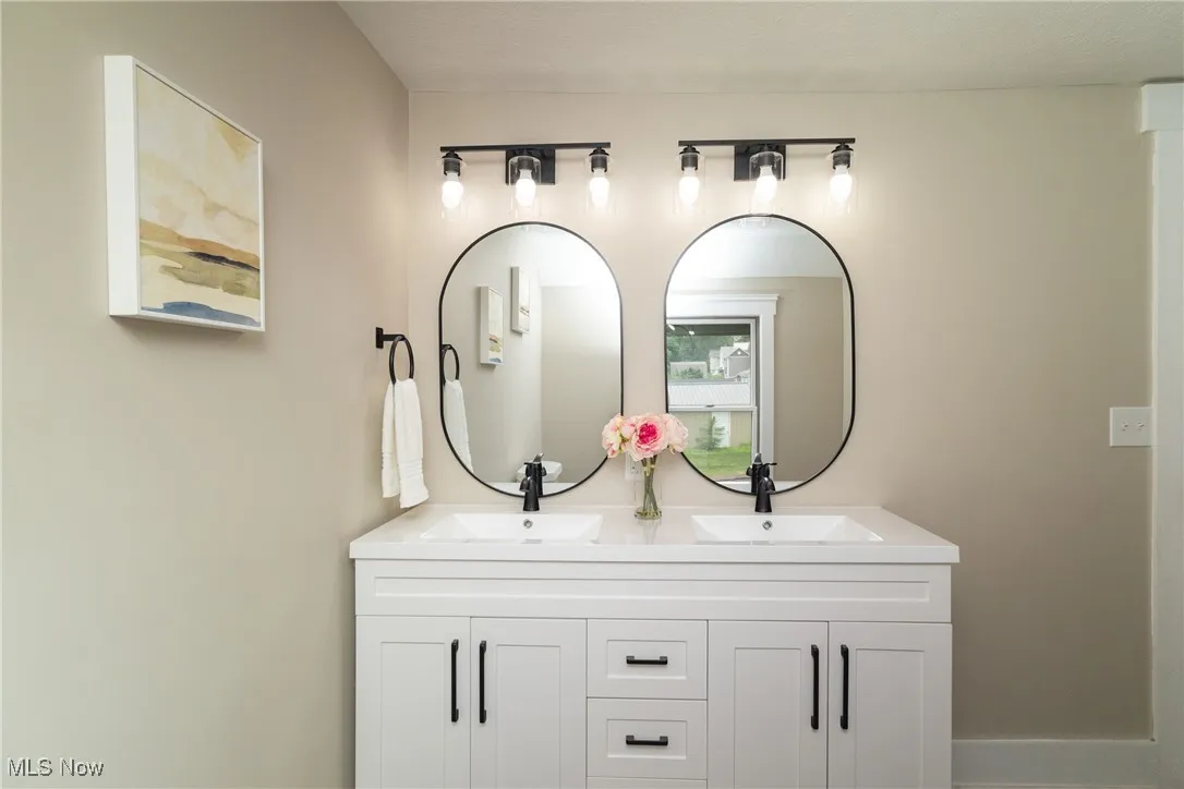 Full bath with double vanity