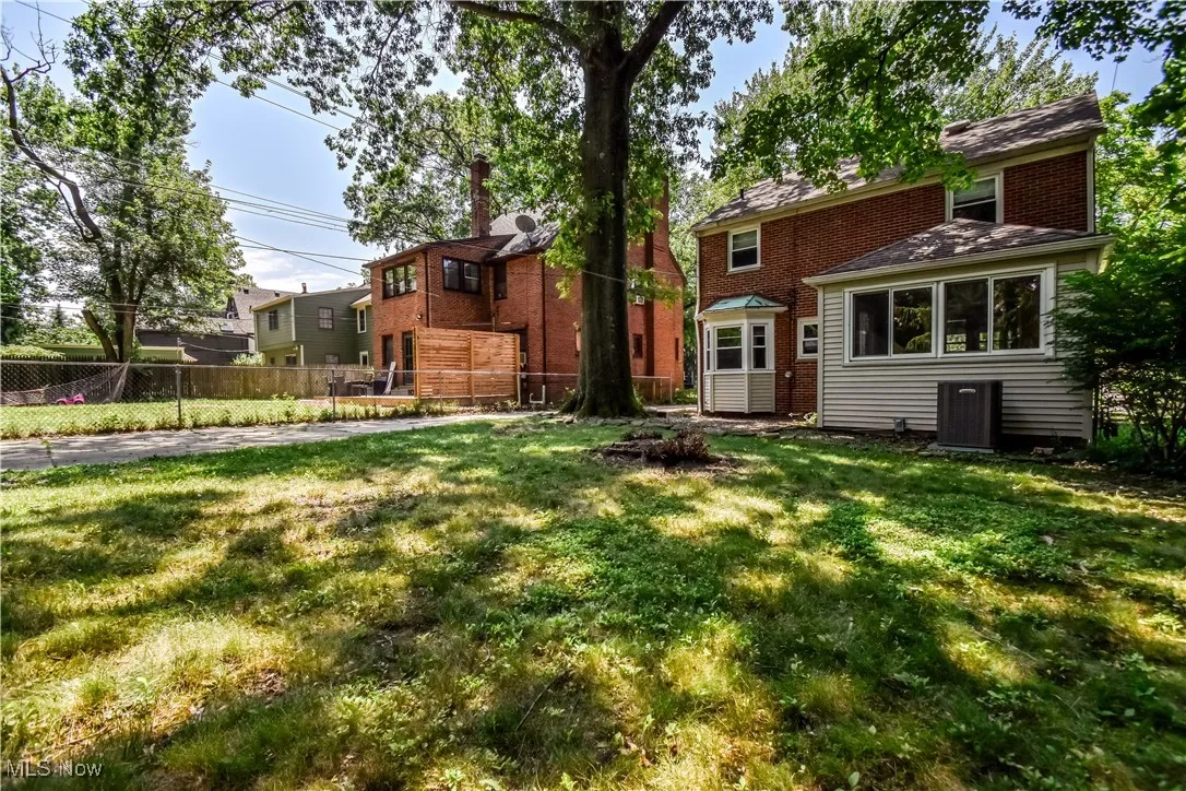 Back of property with brick siding