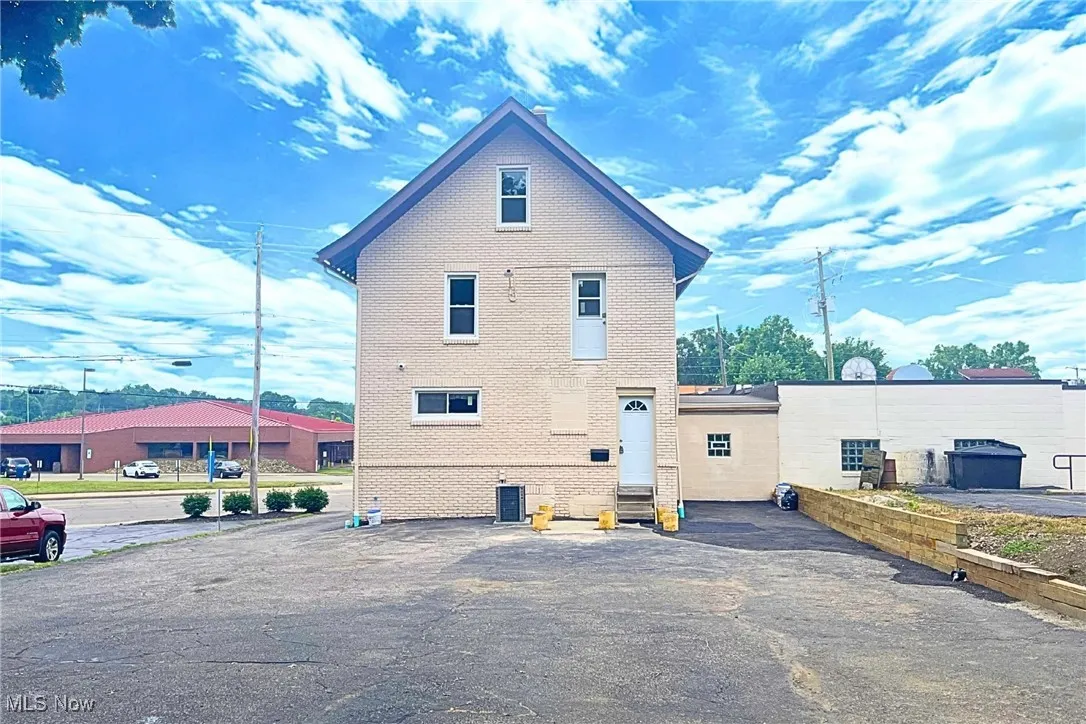 View of home's exterior with brick siding