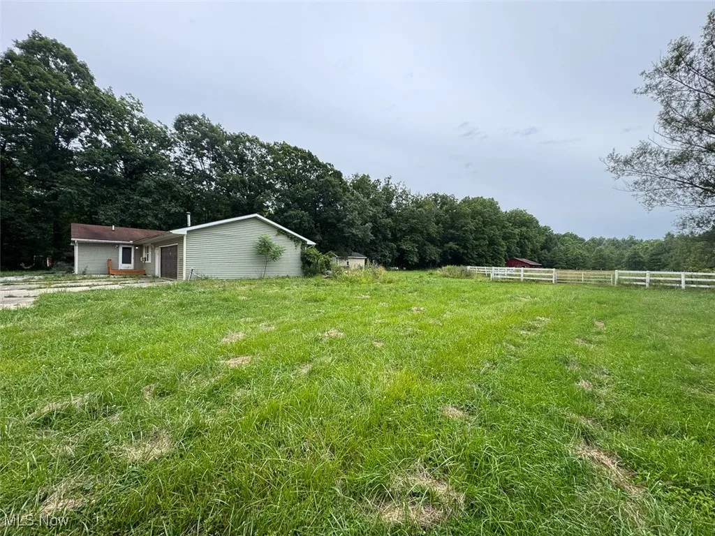 View of yard with a view of countryside