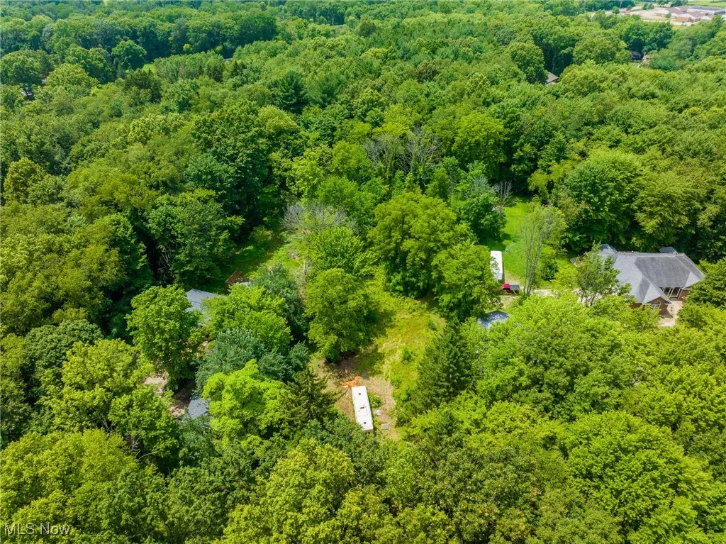 Drone / aerial view of a heavily wooded area