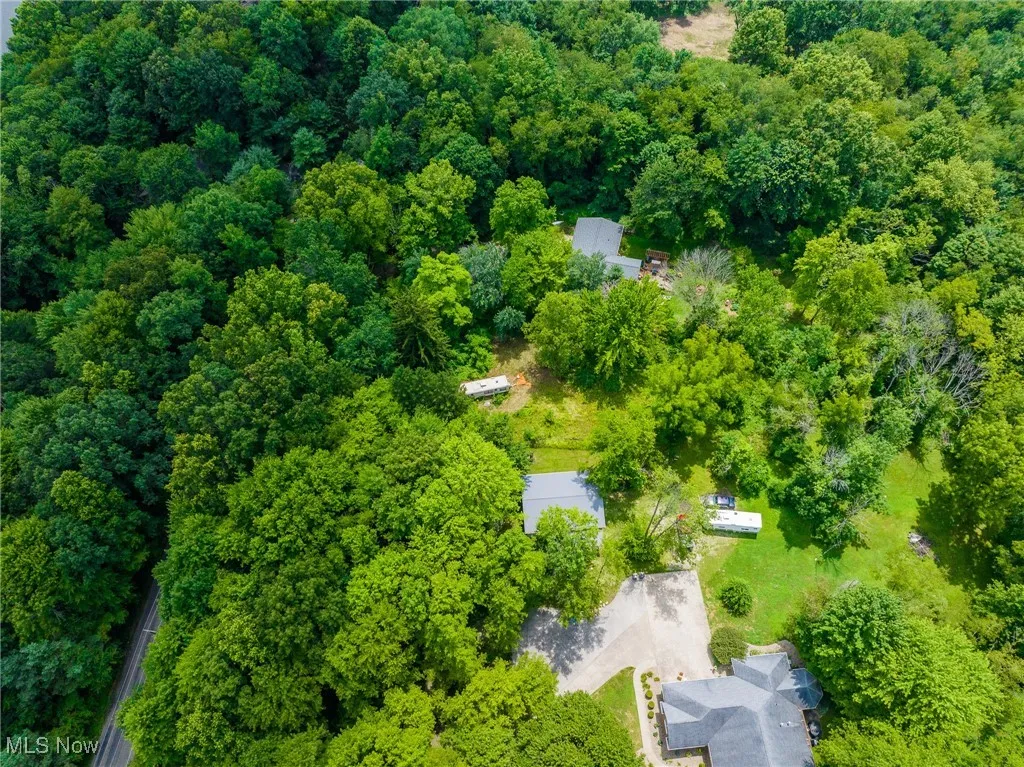 Drone / aerial view of a heavily wooded area