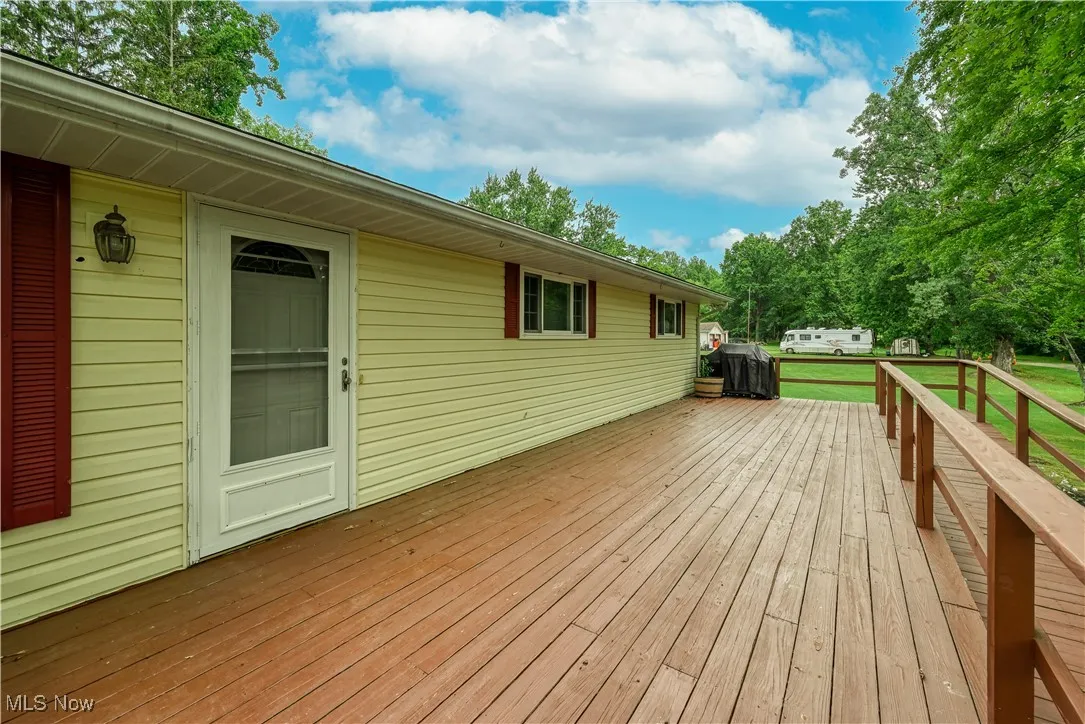 Wooden deck with a lawn