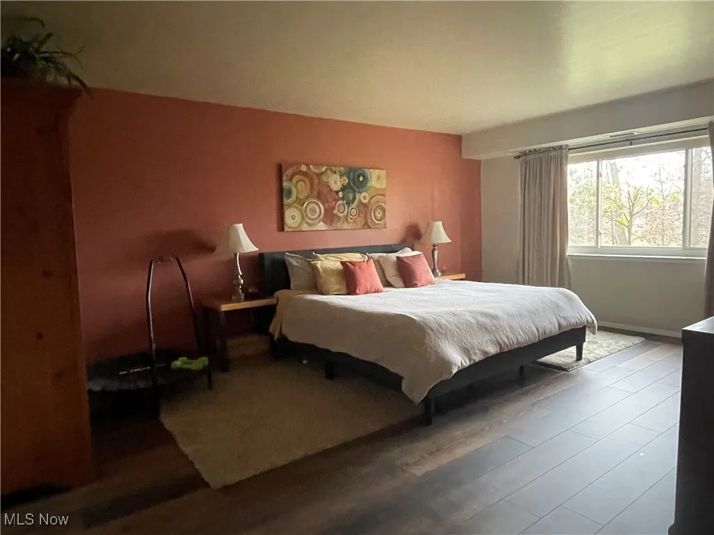 Master Bedroom with beautiful Luxury Vinyl flooring.