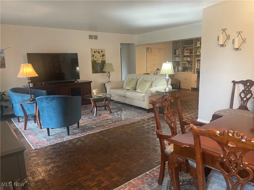 The Living Area to family room/office  with walk out doors to the patio.
