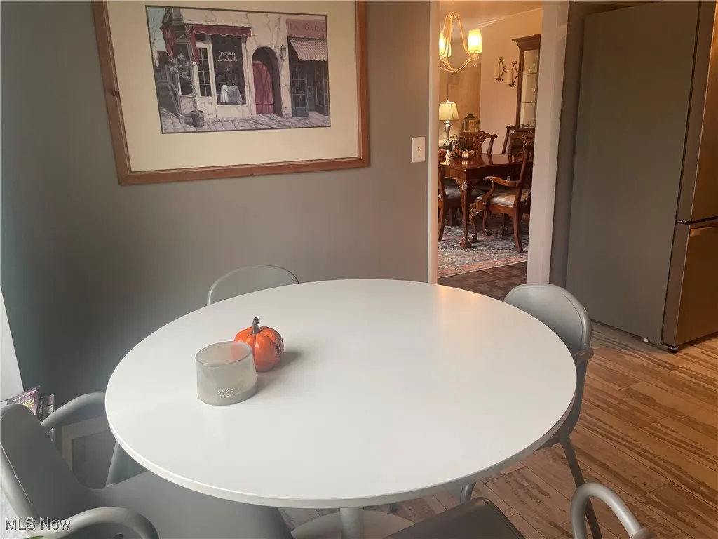 From Dining Room to new luxury vinyl floors in eating area/kitchen.