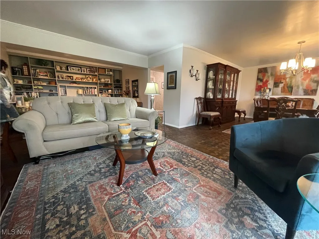 A fuller view of oplen plan living. Entrance to Living and Dining Areas and office/fam rm area.