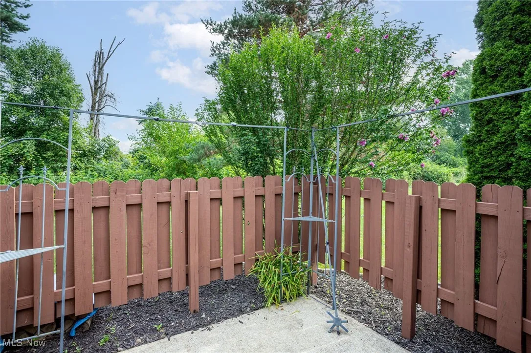 View of fenced backyard