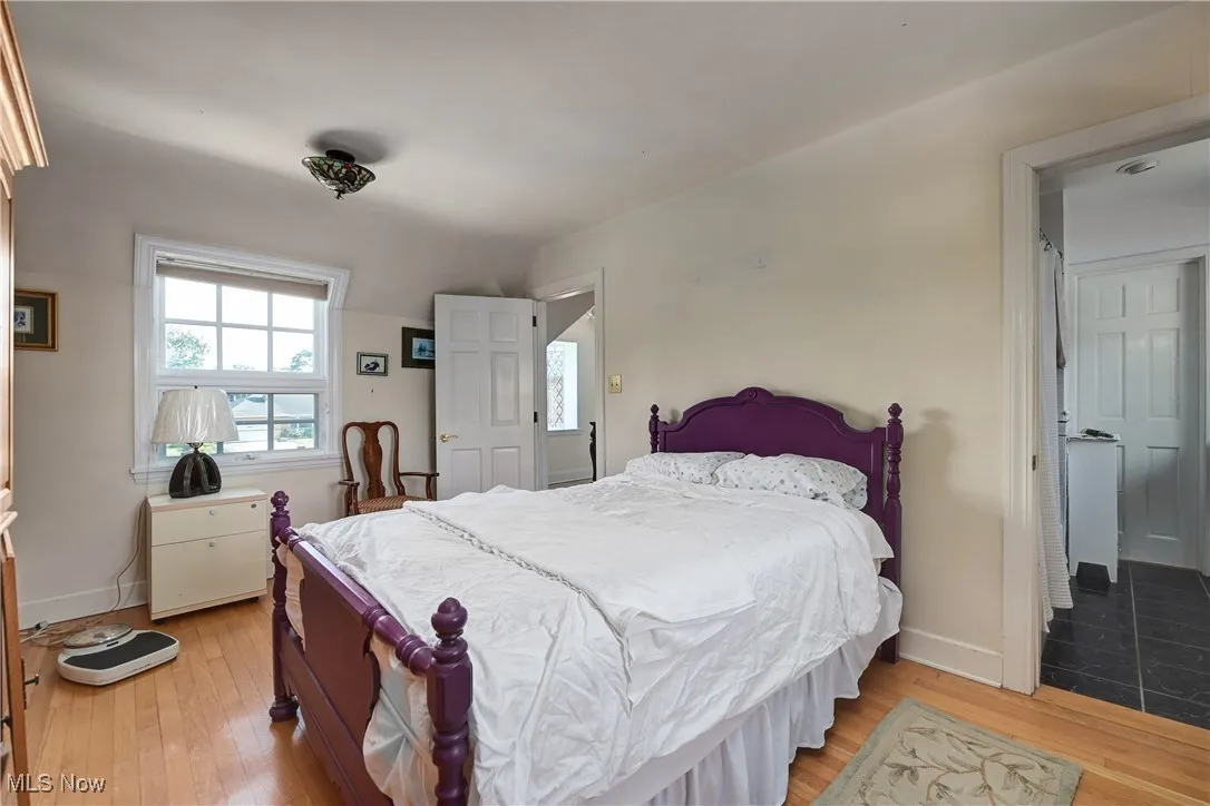 Bedroom with light wood-style flooring