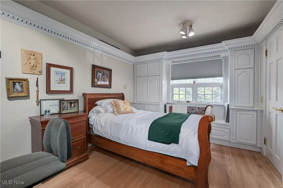 Bedroom with light wood-style flooring