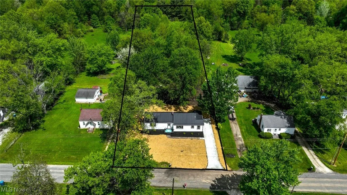 *AERIAL VIEW OF PROPERTY WITH 1.5 ACRES OF LAND BACKS UP TO WOODS