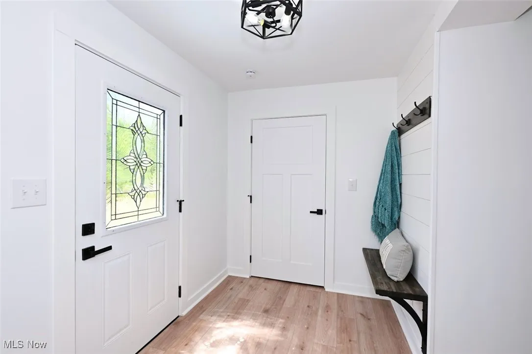 *FOYER ENTRYWAY WITH STAINED GLASS FRONT DOOR, OVERSIZED COAT CLOSET, SHIPLAP BY BENCH/HOOKS, LUXURY PLANK FLOORING & BLACK CAGE ACCENT LED LIGHTING ~