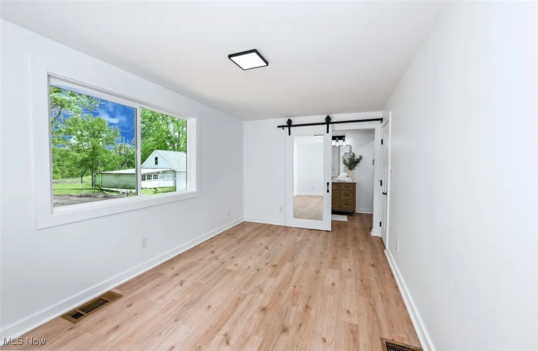 *MASTER BEDROOM W/WALK IN LIGHTED CLOSET, MIRRORED BARN DOOR ENTRY TO AN ENSUITE FULL MASTER BATHROOM! ~