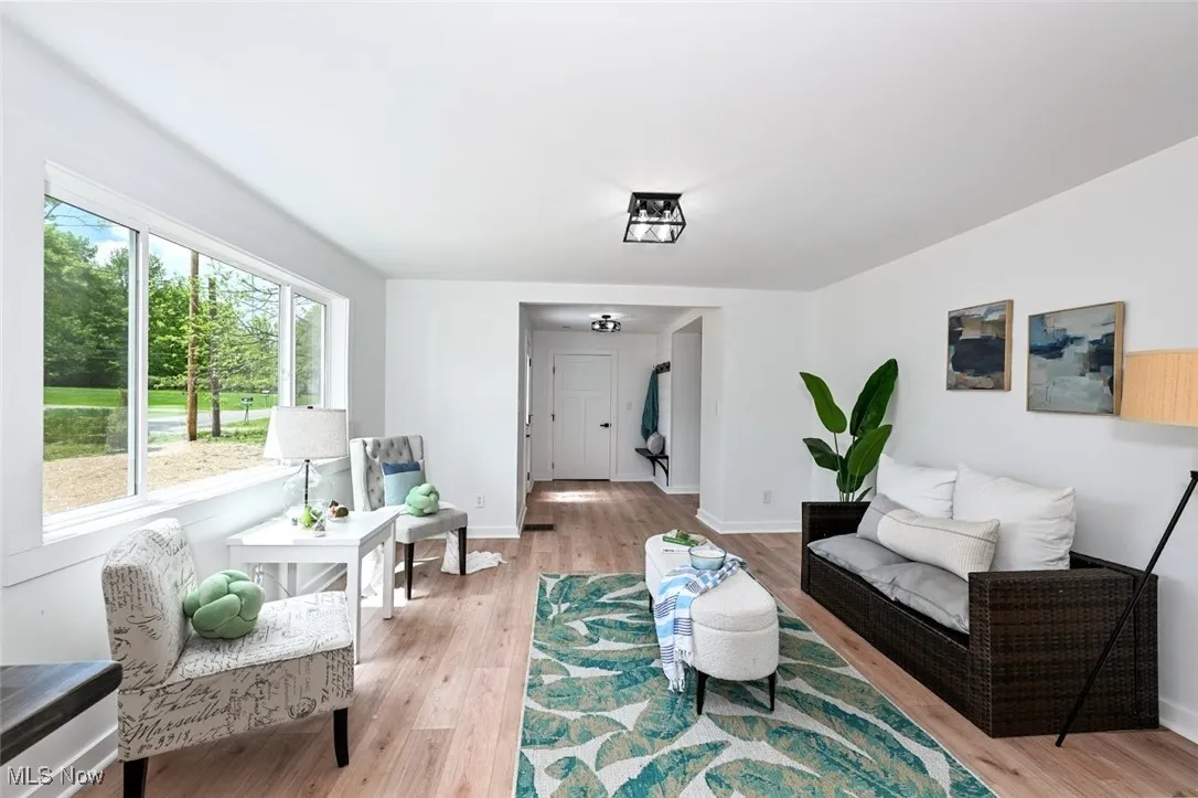 *LIVING RM FRESH PAINT, LUXURY FLOORING, PICTURE WINDOW, BLACK ACCENT LIGHTING ~