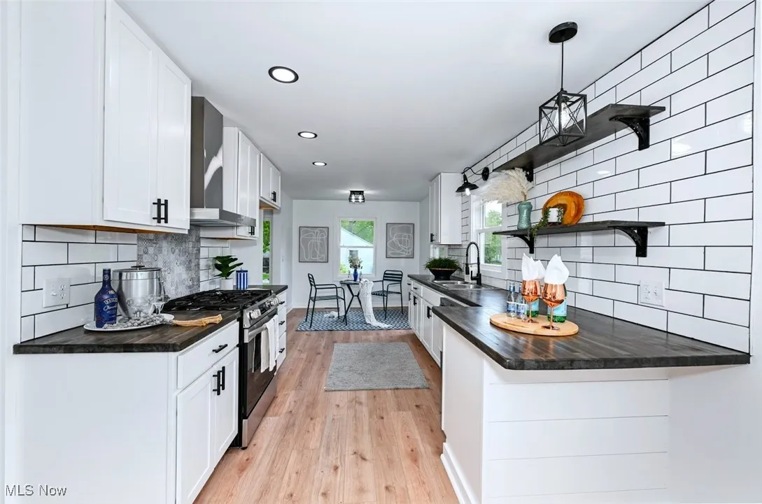 *KITCHEN W/NEW WHITE SHAKER STYLE SOFT CLOSE CABINETS, CUSTOM BUTCHER BLOCK COUNTERTOPS W/BREAKFAST BAR, SUBWAY TILE BACKSPLASH, PENDANT AND RECESSED LIGHTING ~