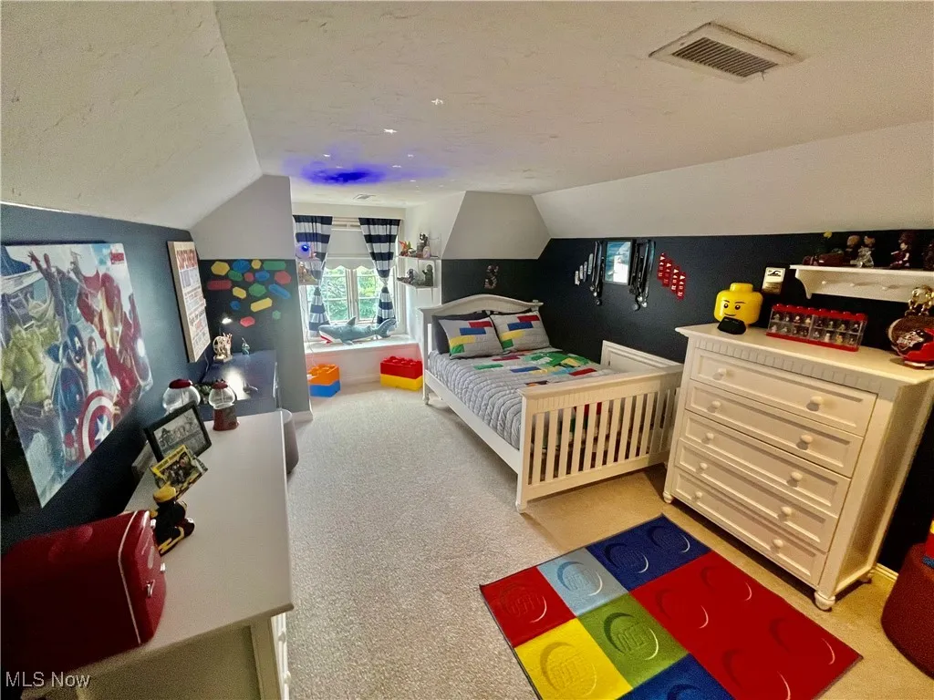 Character filled bedroom with a window seat