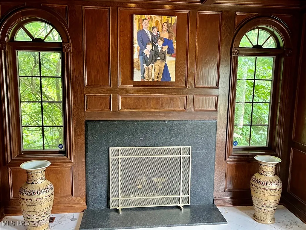 Fireplace in the office with custom cabinets let glass windows spectacular place to work!!