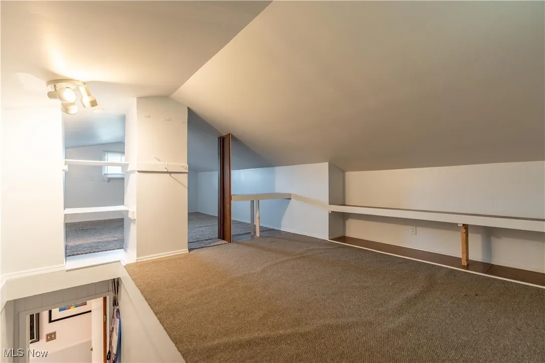 Upstairs bedroom has a closet and attic access