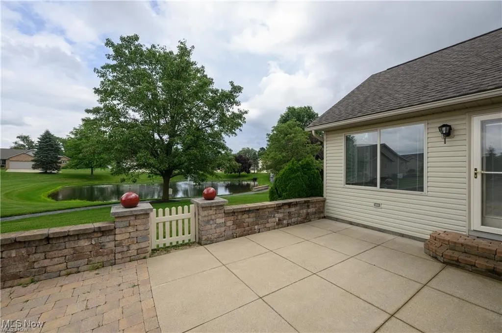 View of patio featuring a water view