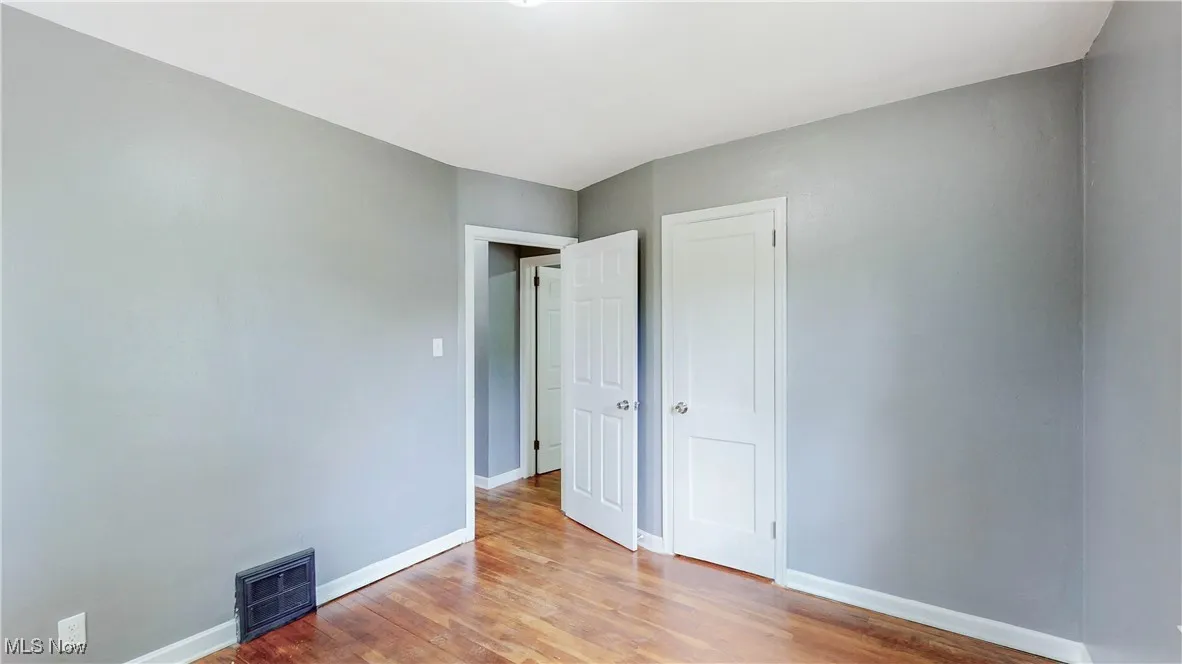 Unfurnished room with light wood-style floors