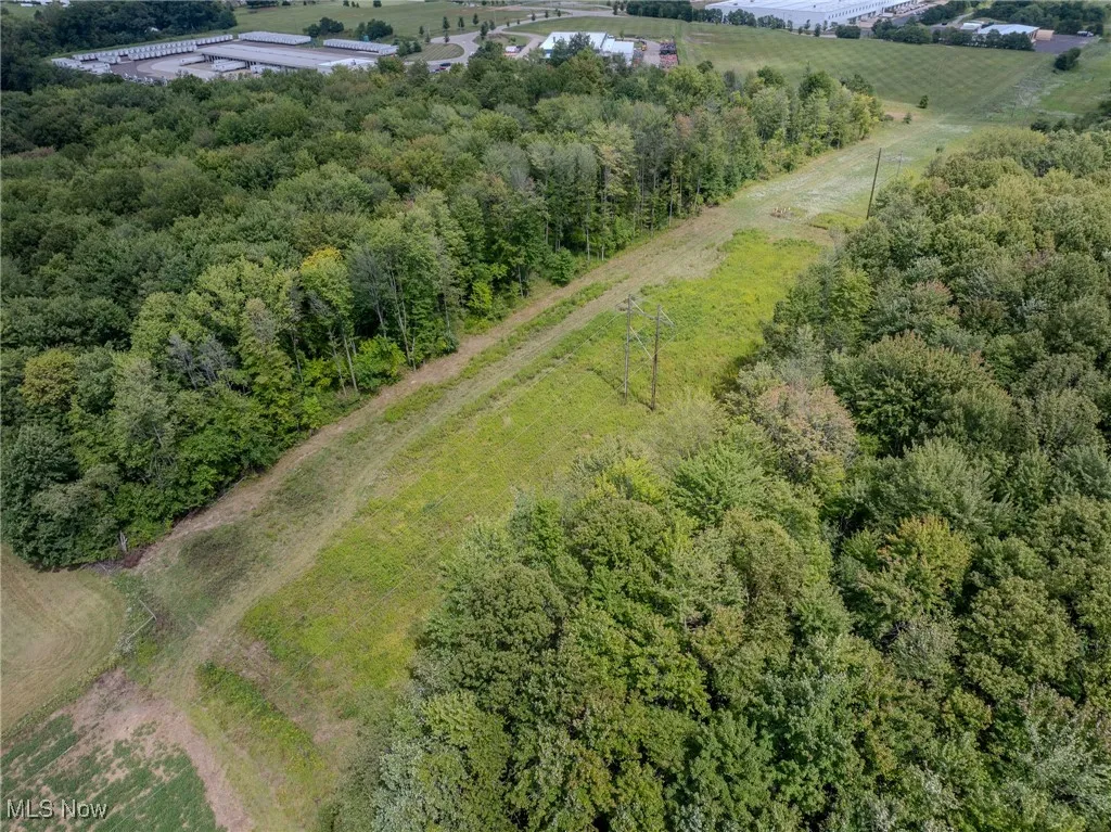 Aerial overview of property's location featuring rural landscape
