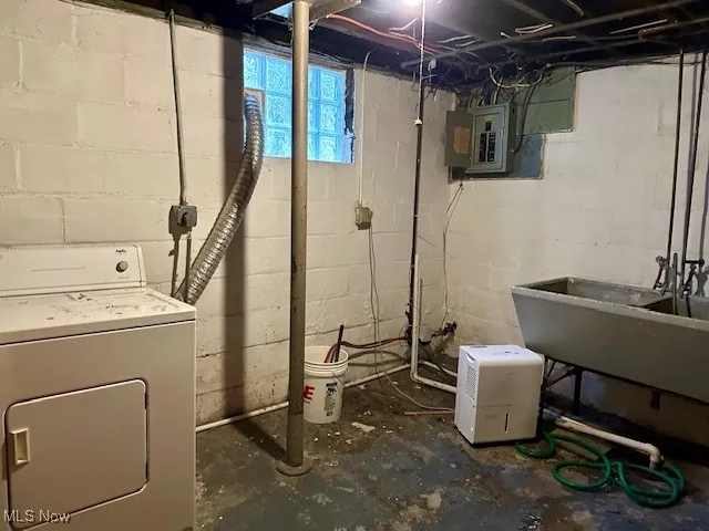 Basement with washer / dryer and electric panel