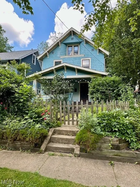 Victorian home featuring covered porch