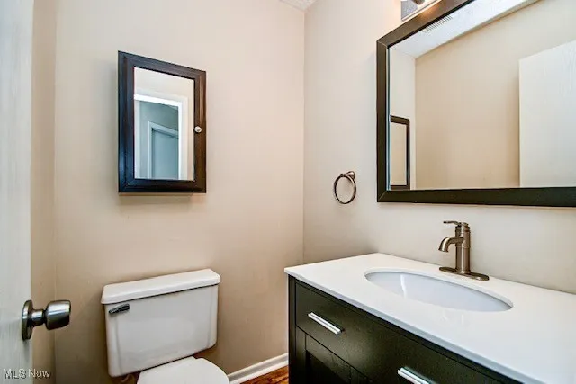 Bathroom featuring toilet and vanity