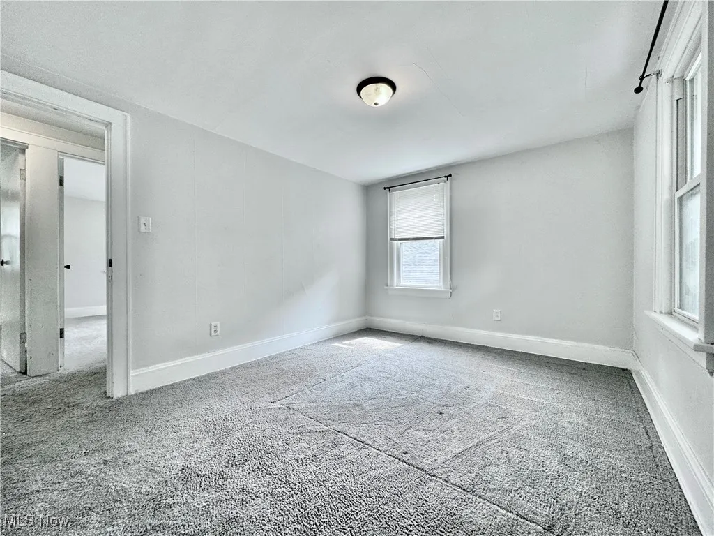 Spare room with carpet floors