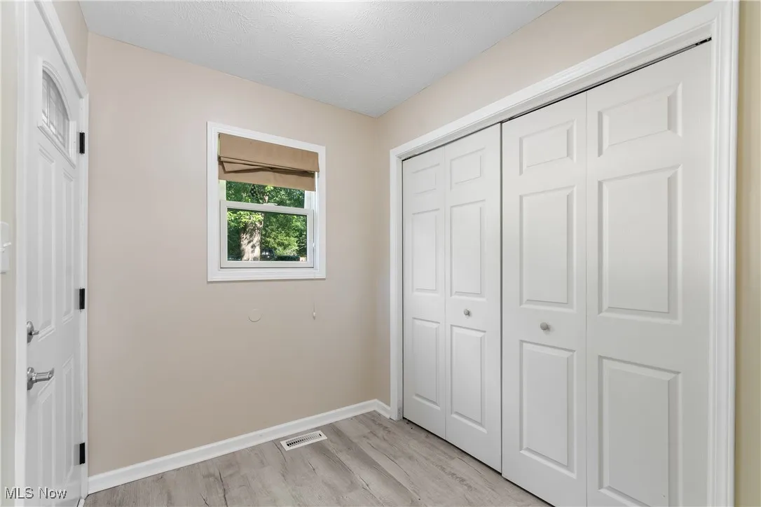 Rear entry across from laundry room