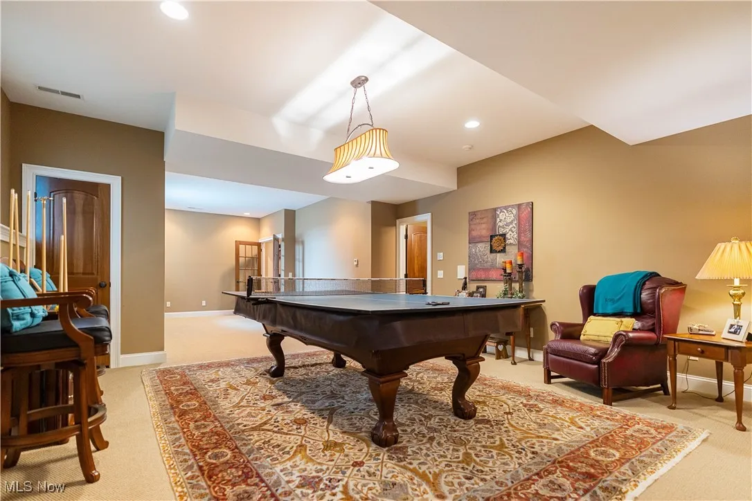 Rec room featuring light colored carpet, pool table, and recessed lighting