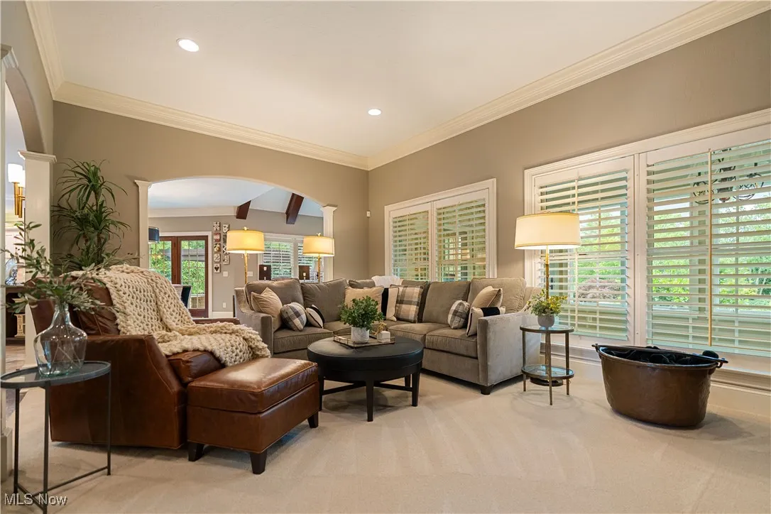 An abundance of natural light in the great room which flows in from the sunroom.