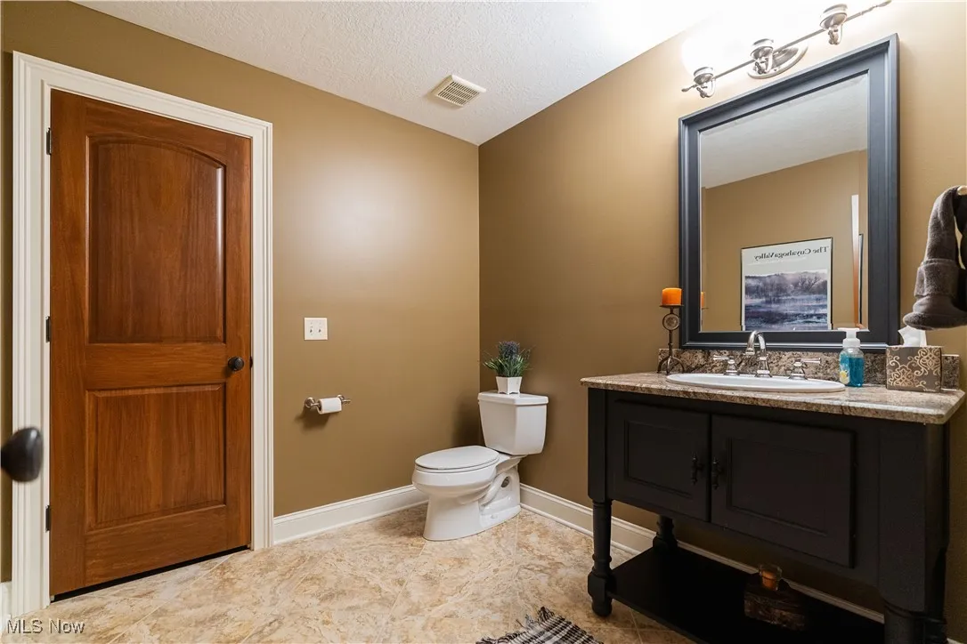 Half bathroom in lower level