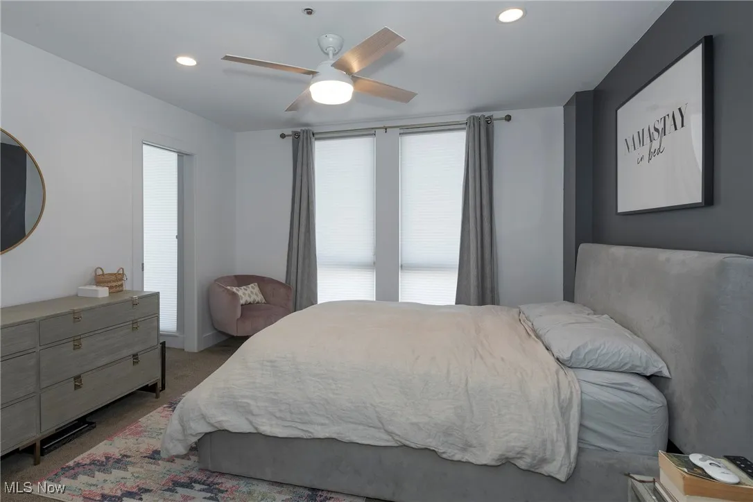 Bedroom with carpet flooring, recessed lighting, and ceiling fan