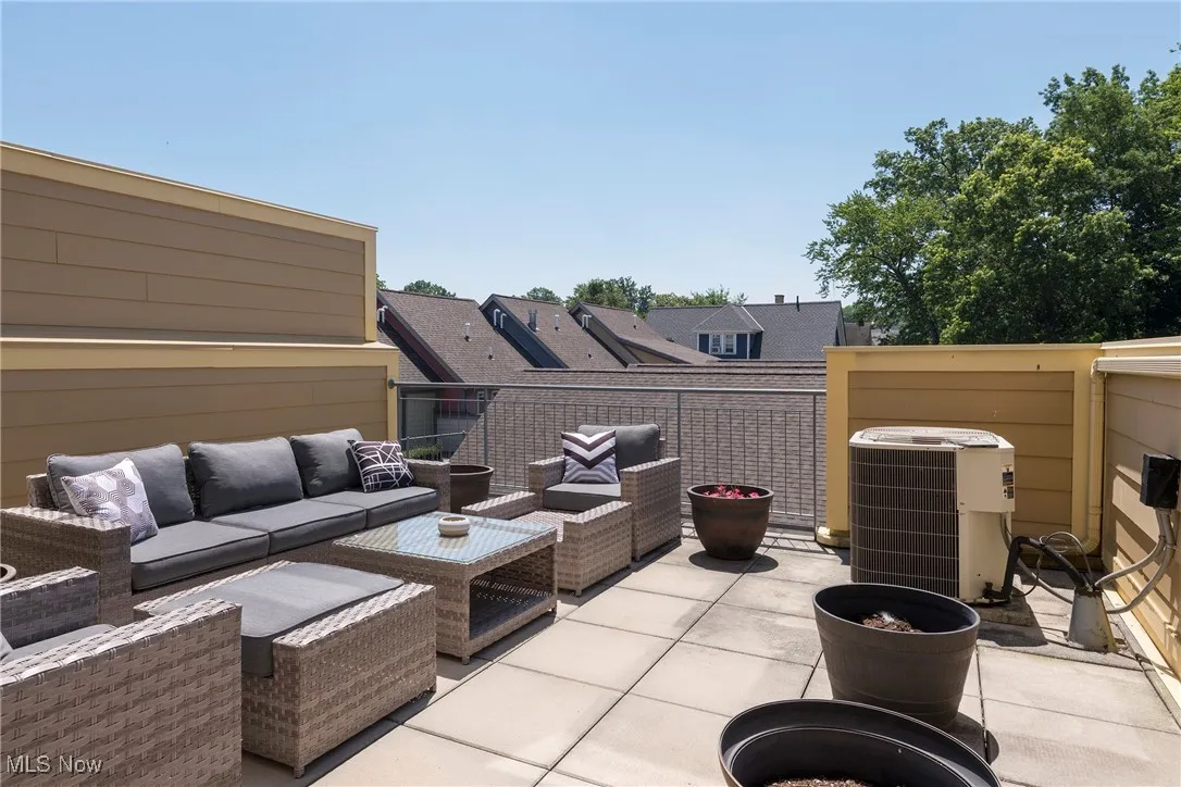 Patio / terrace with an outdoor hangout area