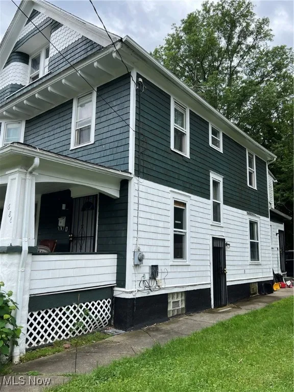 View of home's exterior featuring a porch