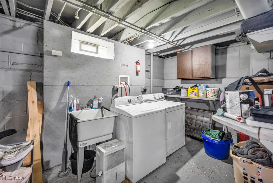 Laundry room with separate washer and dryer