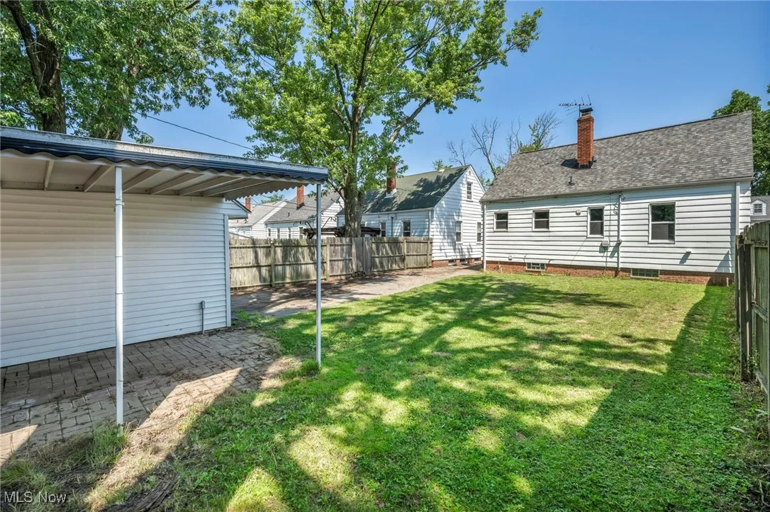 View of fenced backyard