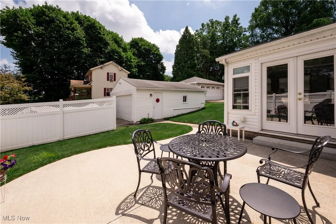  View patio, sunroom and detached garage