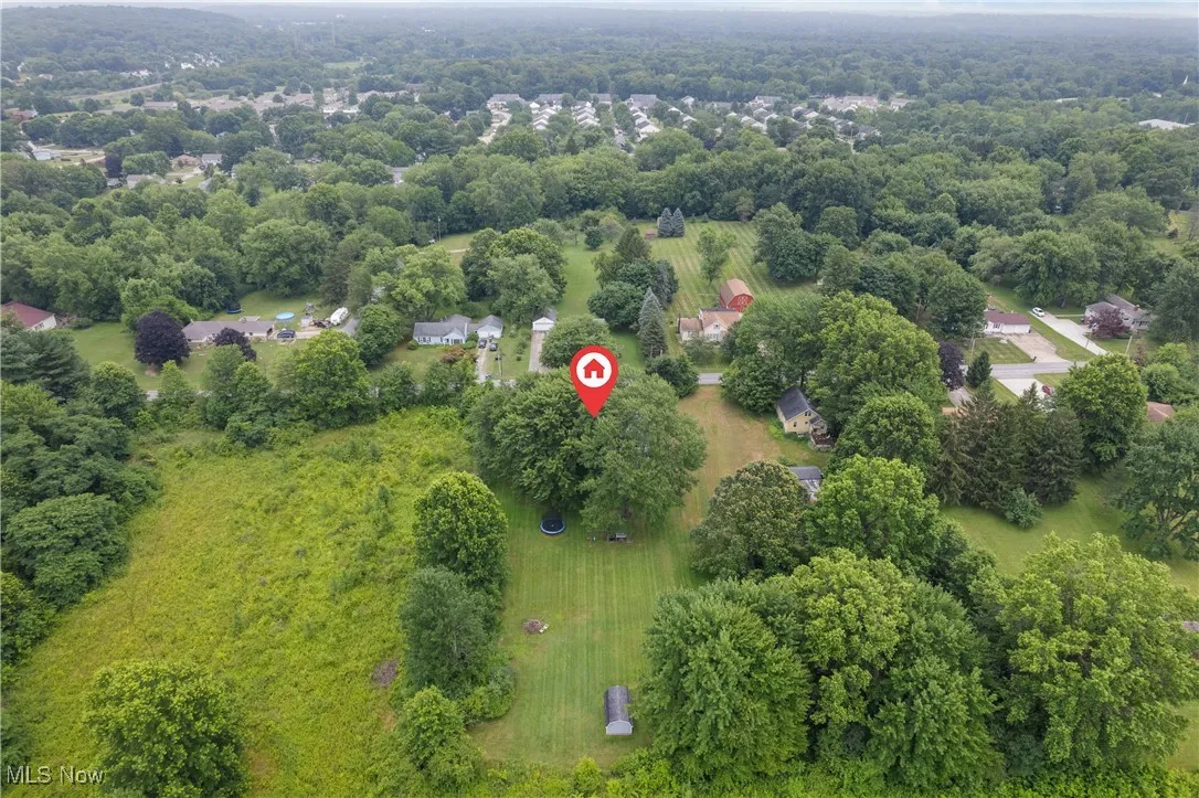 Drone / aerial view of a heavily wooded area