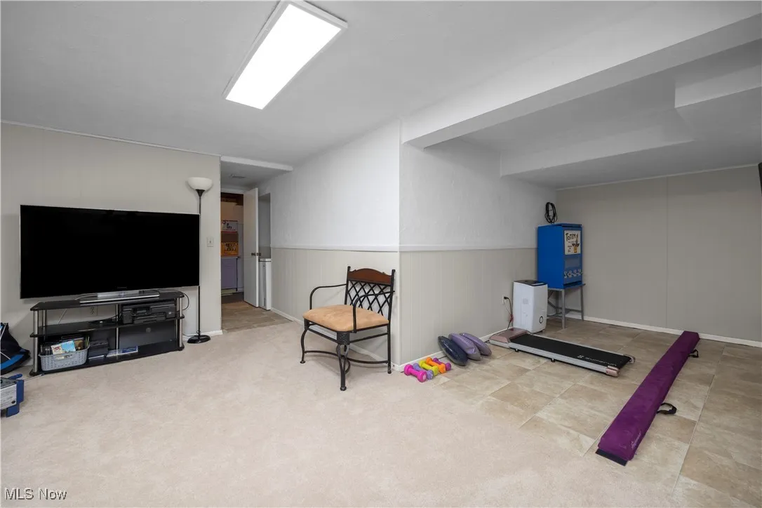 Exercise room with carpet flooring