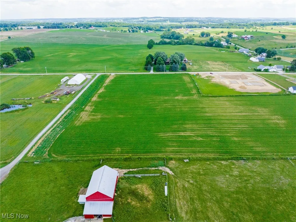 Overview of rural landscape featuring extensive farmland and agricultural land