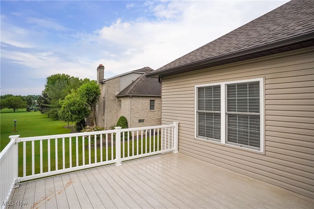 Wooden deck with a yard