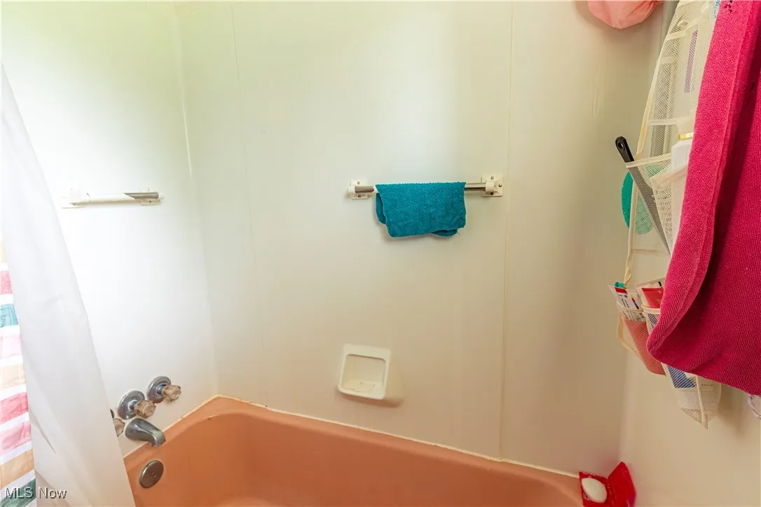 Full bathroom featuring  shower combination